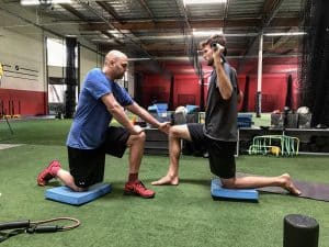 functional sports injury rehab with professional athlete