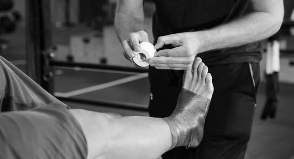 injured athlete ankle wrap